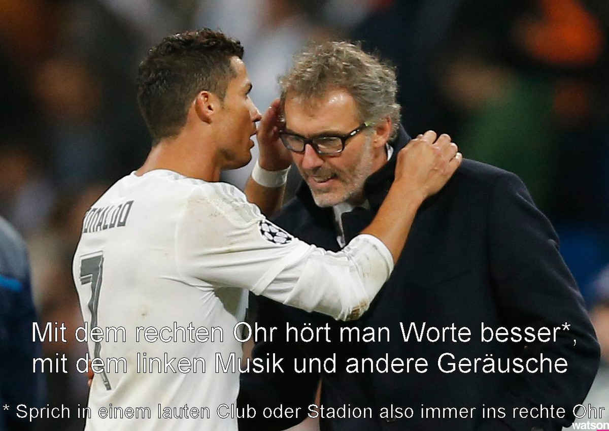 Real Madrid's Cristiano Ronaldo, left, talks with PSG headcoach Laurent Blanc after their Group stage of Champions League Group A soccer match at the Santiago Bernabeu stadium in Madrid, Spain, T ...