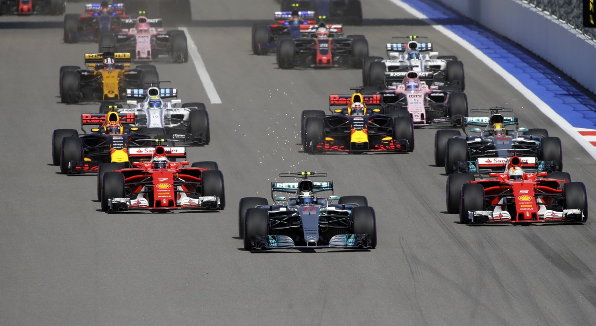 Mercedes driver Valtteri Bottas of Finland, center, leads the race during the first laps of the Formula One Russian Grand Prix at the 'Sochi Autodrom' circuit, in Sochi, Russia, Sunday, Apri ...