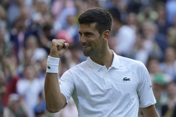 Serbia&#039;s Novak Djokovic celebrates defeating Australia&#039;s Jordan Thompson in the men&#039;s singles match on day three of the Wimbledon tennis championships in London, Wednesday, July 5, 2023 ...