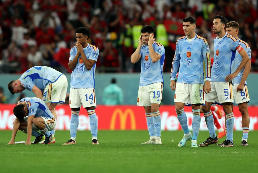 epa10352366 Players of Spain react during the penalty shoot out of the FIFA World Cup 2022 round of 16 soccer match between Morocco and Spain at Education City Stadium in Doha, Qatar, 06 December 2022 ...