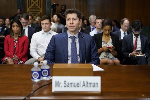 OpenAI CEO Sam Altman waits to speak before a Senate Judiciary Subcommittee on Privacy, Technology and the Law hearing on artificial intelligence, Tuesday, May 16, 2023, on Capitol Hill in Washington. ...