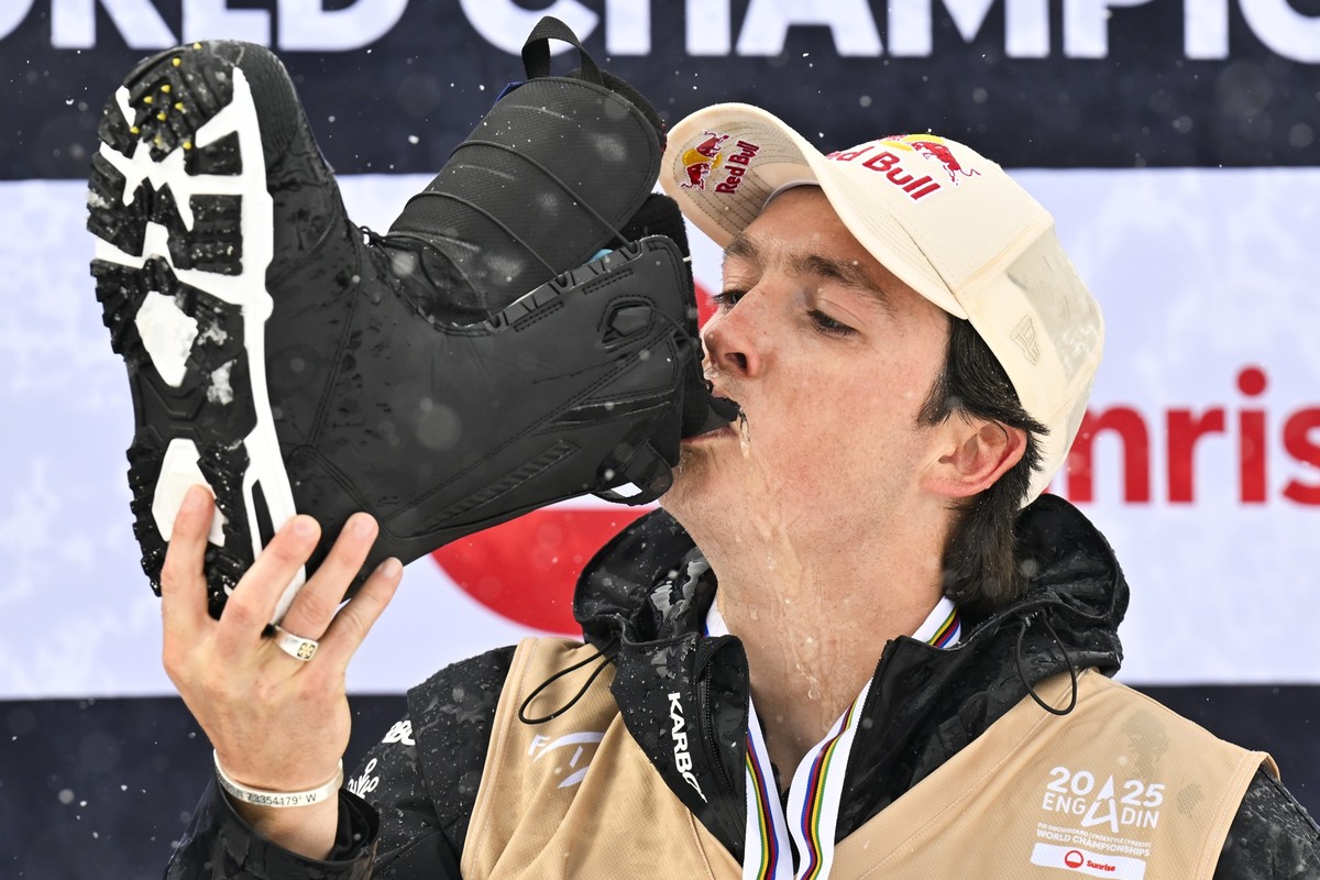 Gold medalist Scotty James of Australia drinks champagne from his boot during the Snowboard Halfpipe competition at the FIS Snowboard, Freestyle and Freeski World Championships on Saturday, March 29,  ...
