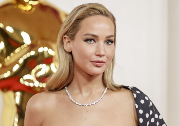 epa11212845 Jennifer Lawrence arrives for the 96th annual Academy Awards ceremony at the Dolby Theatre in the Hollywood neighborhood of Los Angeles, California, USA, 10 March 2024. The Oscars are pres ...