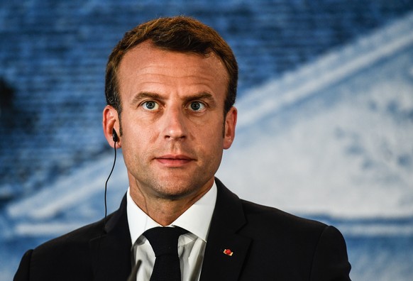 epa06821369 French President Emmanuel Macron attends a press conference during the German-French Minister Meeting in front of the German government&#039;s guest house Meseberg Palace in Meseberg, near ...