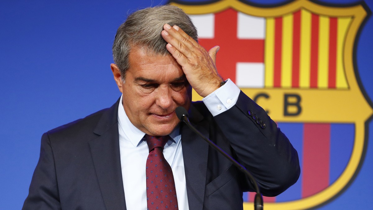 FC Barcelona club President Joan Laporta begins a news conference in Barcelona, Spain, Friday, Aug. 6, 2021. Barcelona's announcement that Lionel Messi would be leaving the club set Paris Saint-G ...