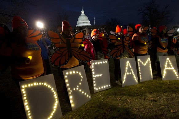 Demonstrators rally in support of Deferred Action for Childhood Arrivals (DACA) during a rally outside of the Capitol Sunday, Jan. 21, 2018, in Washington, on second day of the federal shutdown. Democ ...