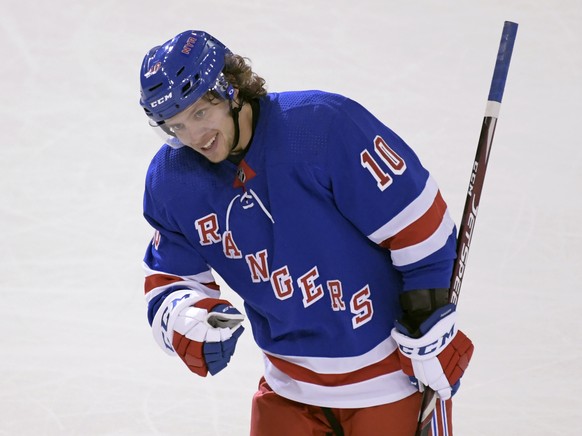 New York Rangers left wing Artemi Panarin celebrates his empty net goal during the third period of an NHL preseason hockey game against the New York Islanders on Tuesday, Sept. 24, 2019, at Madison Sq ...