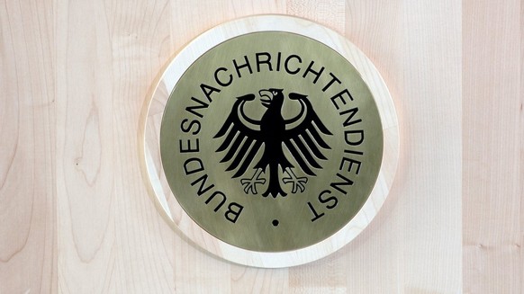 epa04148597 View of the logo of the BND during the opening ceremony for the northern building complex of the new headquarters of the German Intelligence Service BND in Berlin, Germany, 31 March 2014.  ...