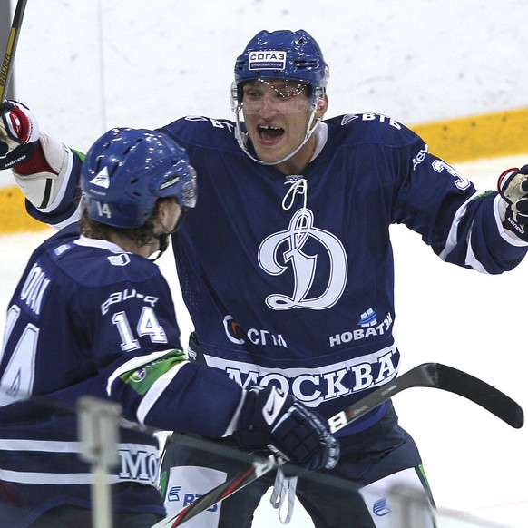 FILE In this file photo taken on Thursday, Sept. 20, 2012, Washington Capitals star forward Alexander Ovechkin, right, of Russia, reacts during the Continental Hockey League, or KHL, ice hockey match  ...