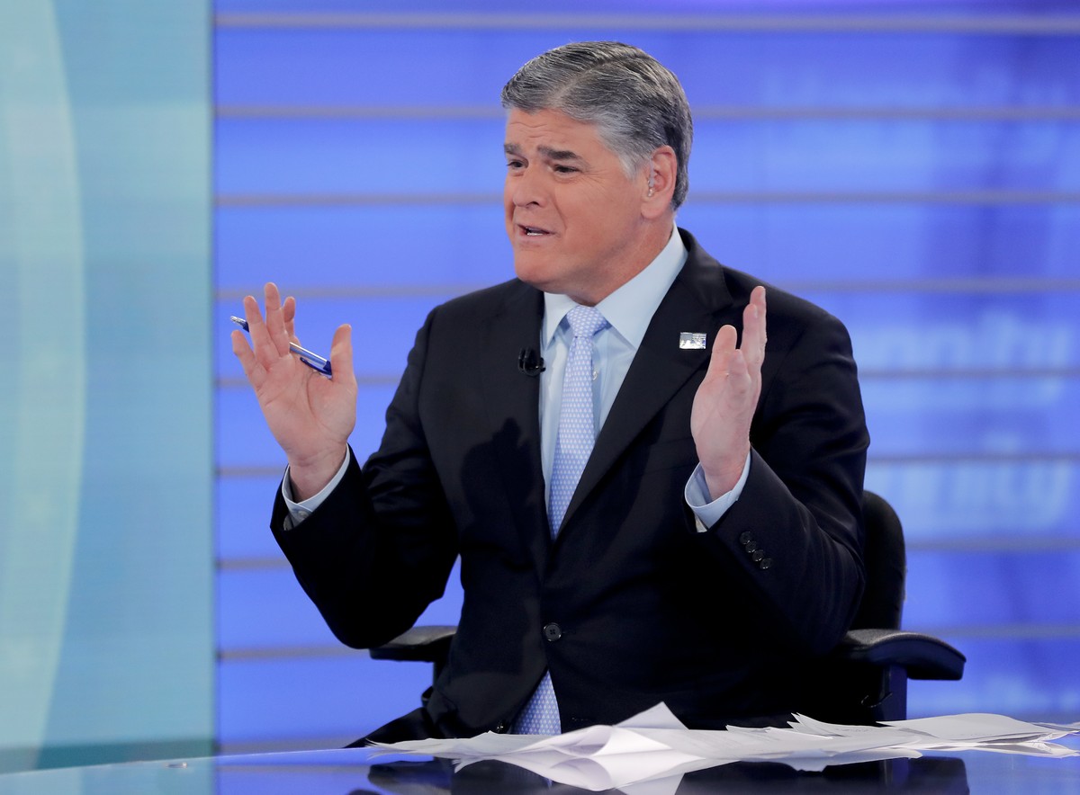 Fox News talk show host Sean Hannity interviews Roseanne Barr during a taping of his show, Thursday, July 26, 2018, in New York. Barr will appear on the Fox News show "Hannity" on Thursday a ...