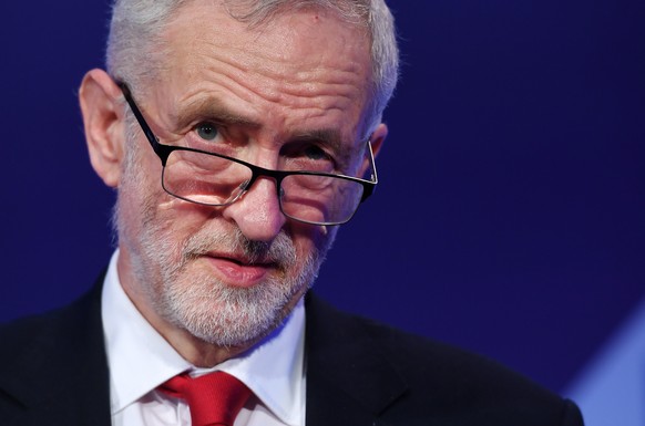 epaselect epa07380833 Labour Party leader Jeremy Corbyn speaks at the EEF Manufacturers Conference in London, Britain, 19 February 2019. Corbyn said he regrets that seven MPs &#039;no longer want to b ...