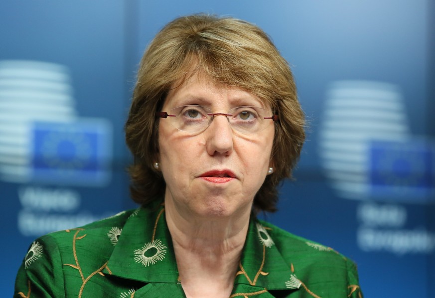 epa04326384 European Union High Representative for Foreign Affairs, Catherine Ashton, gives a press conference after a Foreign Affairs Council meeting at the EU Council headquarters in Brussels, Belgi ...