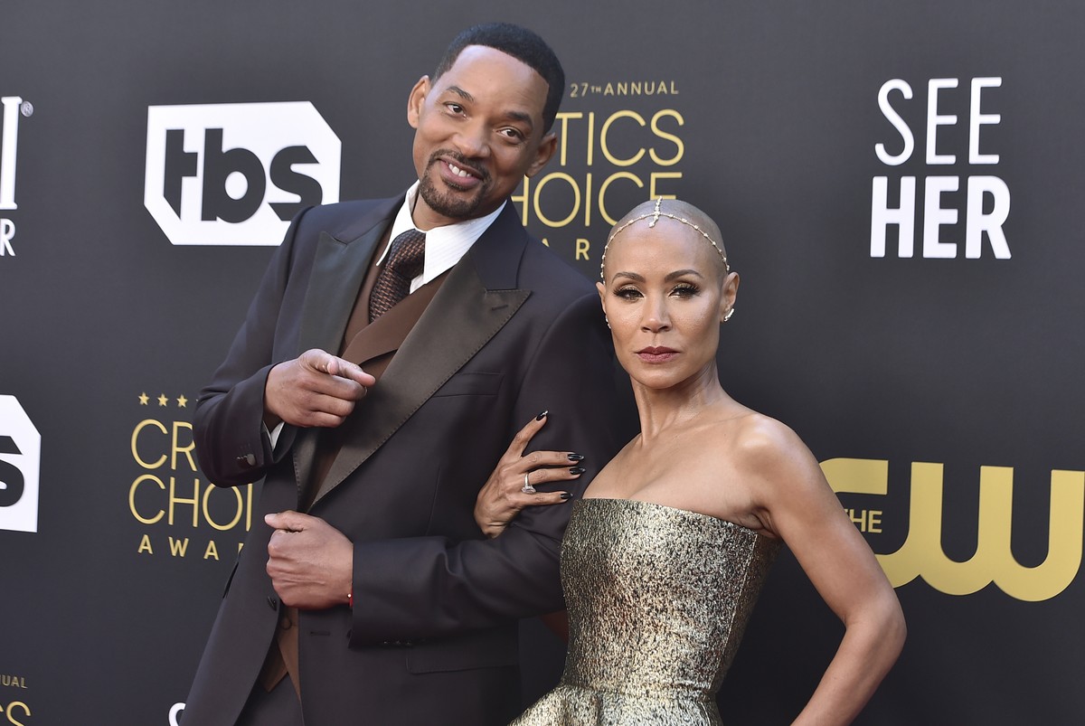 FILE - Will Smith, left, and Jada Pinkett Smith arrive at the 27th annual Critics Choice Awards in Los Angeles on March 13, 2022. Pinkett Smith and husband Will Smith have lived what she says are ?com ...