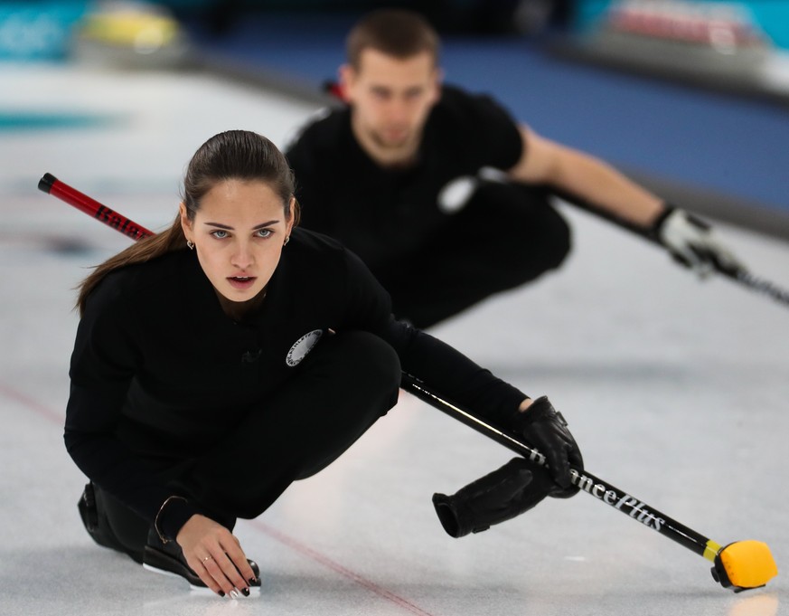 epa06518077 Anastasia Bryzgalova (L) and Aleksandr Krushelnitckii of the Olympic Athlete from Russia play Jenny Perret and Martin Rios of Switzerland in the Mixed Doubles Round Robin semi final match  ...