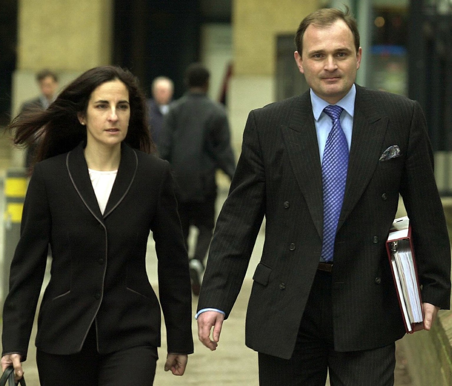 Major Charles Ingram and his wife Diana arrive at Southwark Crown Court in London, Wednesday March 5, 2003, where they are charged, along with college lecturer Tecwen Whittock, of attempting to win th ...