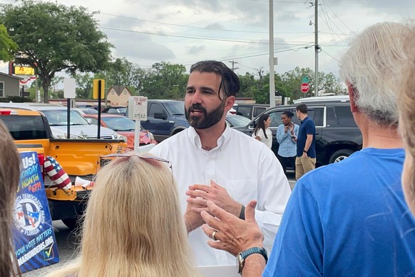 Josh Weil talks to a group of supporters during a Get Out the Vote event in Ocala, Fla., Monday, March 31, 2025. (AP Photo/Stephany Matat)
Election 2025 Florida Special Election