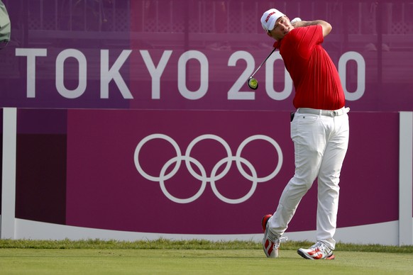 epa09375041 Sepp Straka of Austria on the first hole during the first round of the Golf events of the Tokyo 2020 Olympic Games at the Kasumigaseki Country Club in Kawagoe, Japan, 29 July 2021. EPA/MIC ...