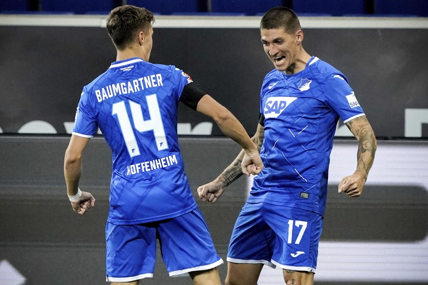 Hoffenheim&#039;s Steven Zuber celebrates after scoring his side&#039;s third goal during the German Bundesliga soccer match between TSG 1899 Hoffenheim and 1. FC Cologne in Sinsheim, Germany, Wednesd ...