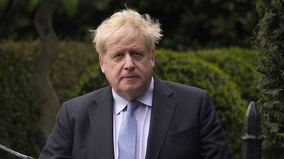 FILE - Boris Johnson leaves his house in London, on March 22, 2023. Former Prime Minister Boris Johnson deliberately misled Parliament about the lockdown-flouting parties that undermined his credibili ...