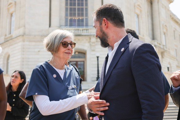 Healthcare Panel At U.S. Capitol Actor Noah Wyle, right, walks through Capitol Hill with his mother, retired nurse Marjorie Wyle-Katz, following a panel discussion on issues impacting healthcare worke ...