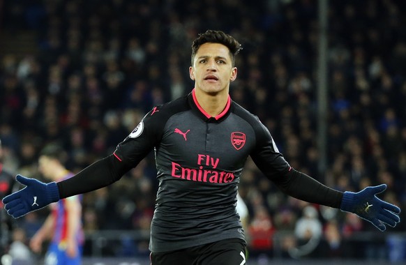 FILE - In this Thursday, Dec. 28, 2017 file photo, Arsenal&#039;s Alexis Sanchez celebrates after scoring his side&#039;s third goal of the game during their English Premier League soccer match agains ...