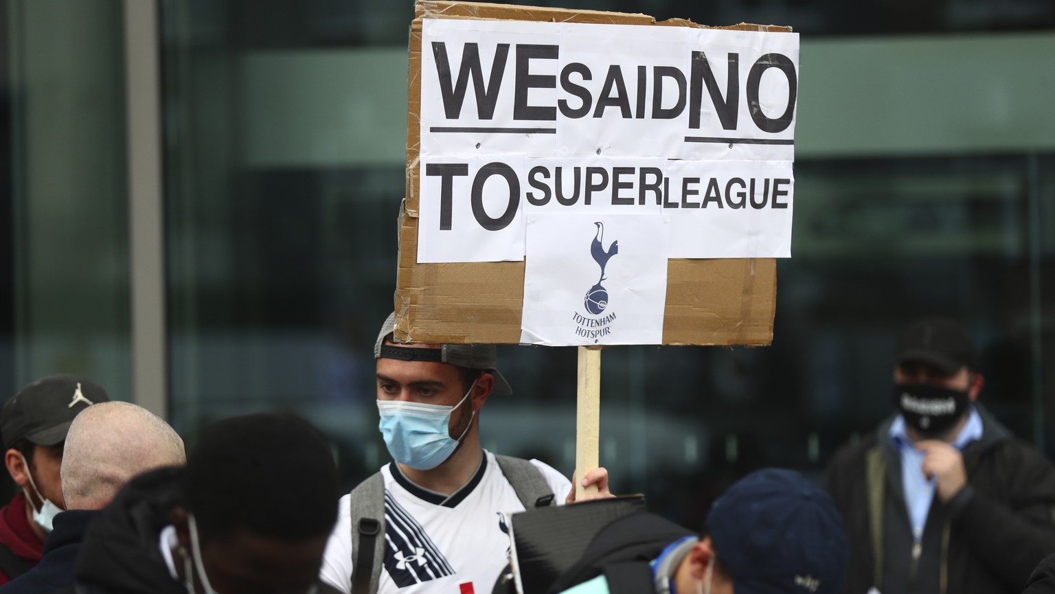 Tottenham fans stage a protest against the Board over the planned creation of a European Super League, outside the Tottenham Hotspur Stadium ahead of the English Premier League football match between  ...