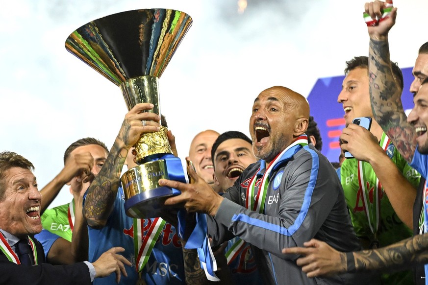 Luciano Spalletti head coach of SSC Napoli lifts the trophy as he celebrates with teammates the victory of the italian championship Serie A at Diego Armando Maradona stadium in Naples Italy, June 4th, ...