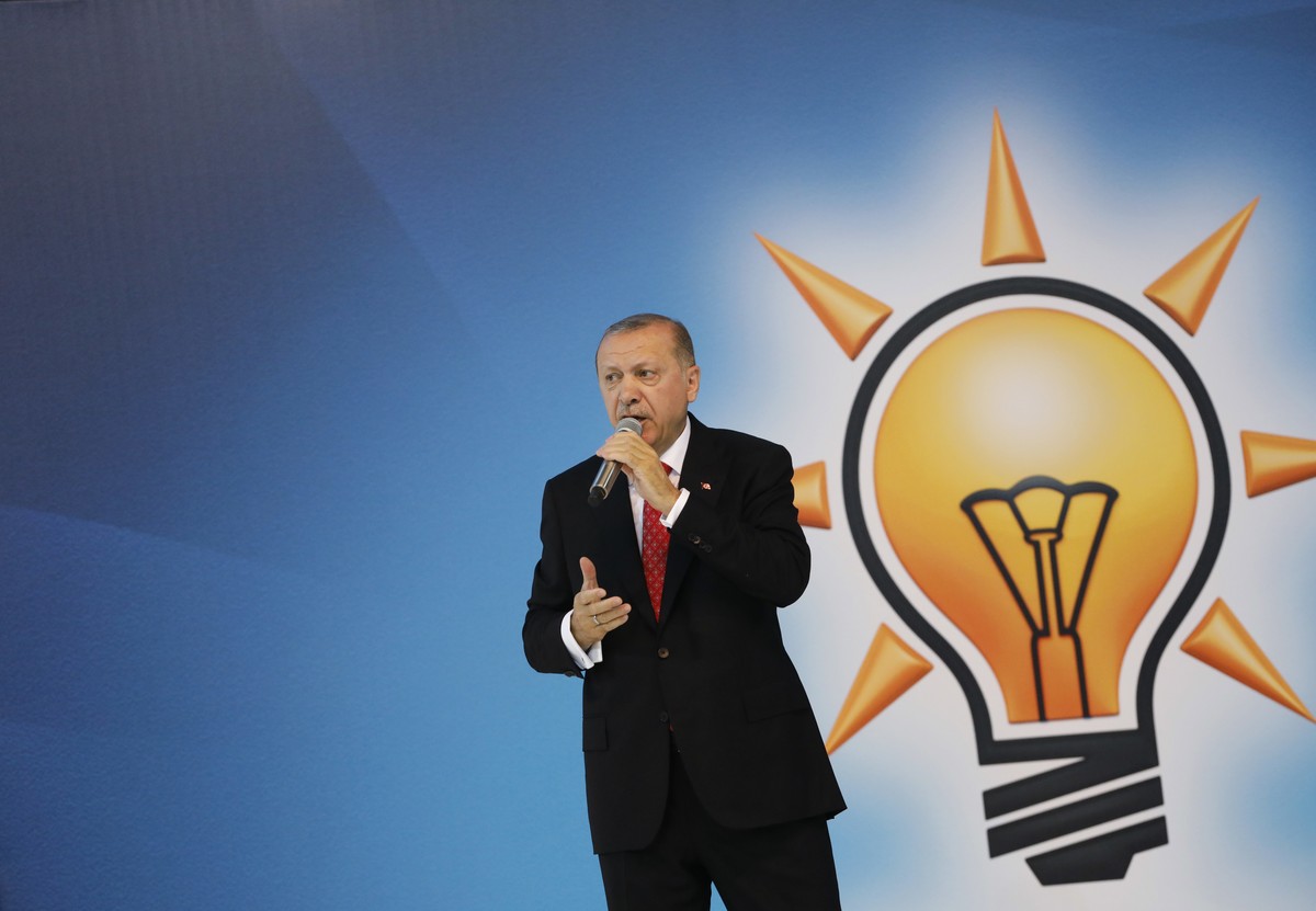 Turkey's President Recep Tayyip Erdogan delivers a speech to supporters of his ruling Justice and Development (AKP) Party, to outline his plans for after the elections and present MP candidates,  ...