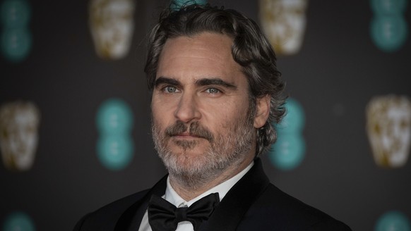 Actor Joaquin Phoenix poses for photographers upon arrival at the Bafta Film Awards, in central London, Sunday, Feb. 2 2020. (Photo by Vianney Le Caer/Invision/AP)
Joaquin Phoenix