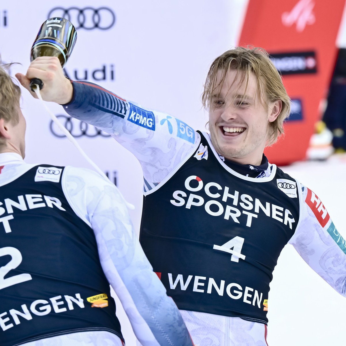 Second placed Timon Haugan of Norway, left, and winner Atle Lie McGrath of Norway, right, on the podium after the men's slalom race at the Alpine Skiing FIS Ski World Cup, in Wengen, Switzerland, ...