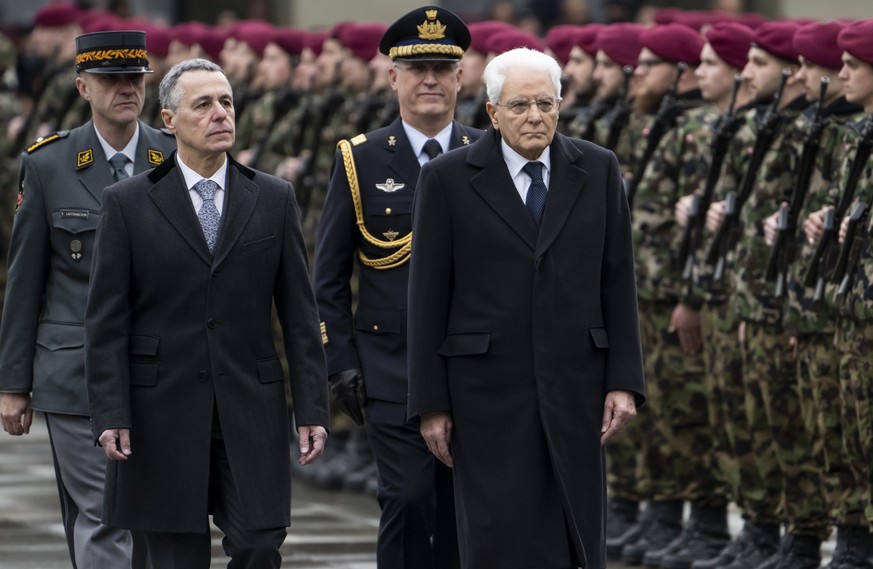 Ignazio Cassis, President of the Swiss Confederation, left, and his guest, Sergio Mattarella, President of Italy, inspect the guard of honour of the Swiss Army, Tuesday, November 29, 2022 in Bern, Swi ...