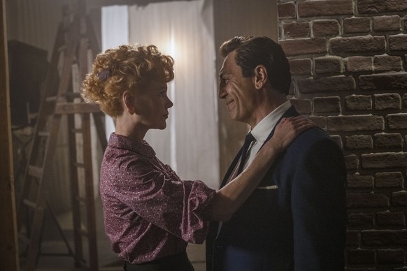 This image released by Amazon shows Nicole Kidman as Lucille Ball, left, and Javier Bardem as Desi Arnaz in a scene from &quot;Being the Ricardos.&quot; (Glen Wilson/Amazon via AP)
