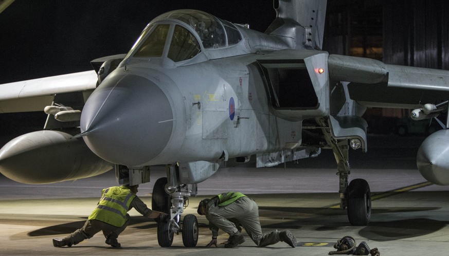 epa06667928 A handout photo made available by the British Ministry of Defence (MoD) showing a British Royal Air Force (RAF) Tornado after landing at RAF Akrotiri, Cyprus, 14 April 2018 after conductin ...