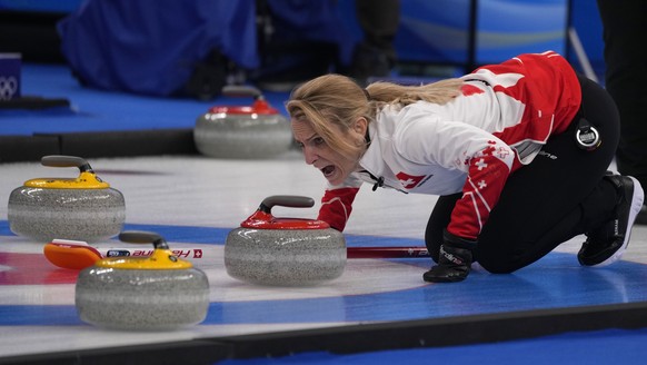 Switzerland&#039;s Silvana Tirinzoni shouts instructions to teammates during a women&#039;s curling semifinal match between Japan and Switzerland at the Beijing Winter Olympics Friday, Feb. 18, 2022,  ...