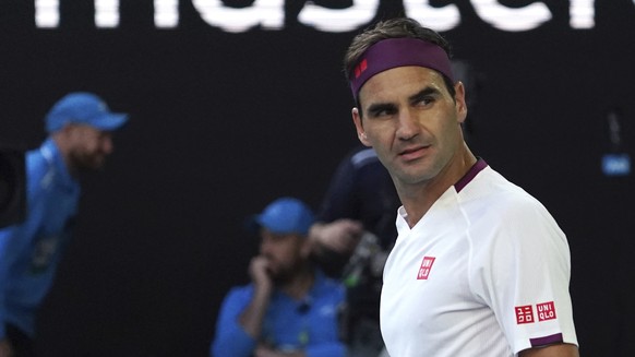 Switzerland&#039;s Roger Federer reacts after defeating Tennys Sandgren of the U.S. in their quarterfinal match at the Australian Open tennis championship in Melbourne, Australia, Tuesday, Jan. 28, 20 ...