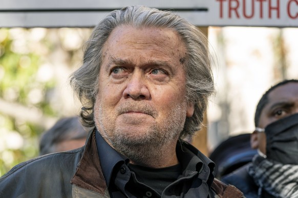 FILE - Former White House strategist Steve Bannon speaks with reporters after departing federal court on Nov. 15, 2021, in Washington. The House committee investigating the Jan. 6 riot is returning Th ...