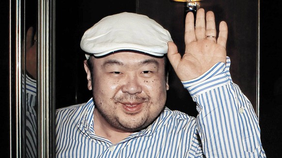 FILE - In this June 4, 2010, file photo, dressed in jeans and blue suede loafers, Kim Jong Nam, the eldest son of then North Korean leader Kim Jong Il, waves after his first-ever interview with South  ...