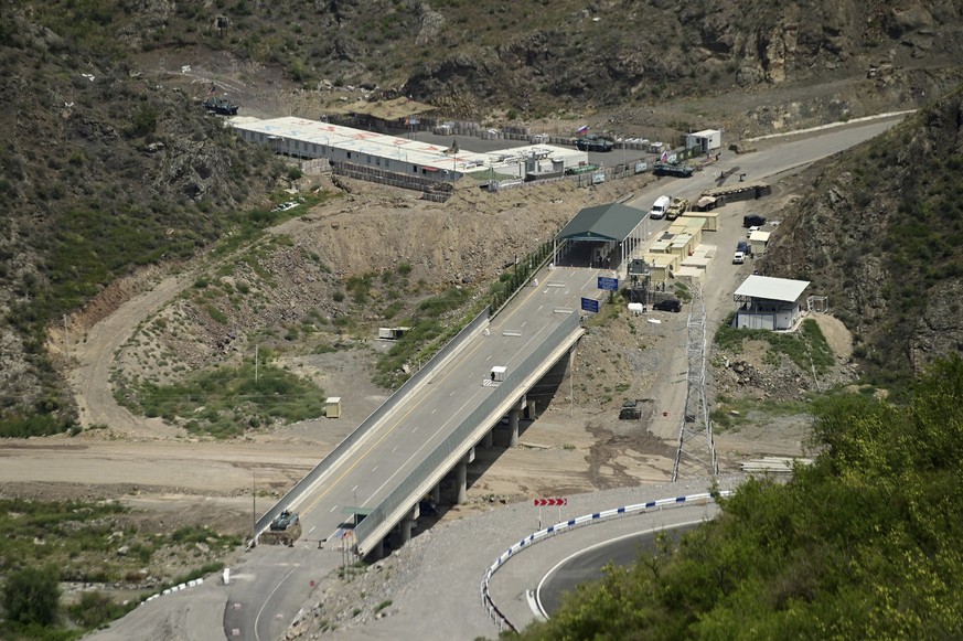 A bridge and a checkpoint are seen on a road towards the separatist region of Nagorno-Karabakh, in Armenia, Friday, July 28, 2023. The former chief prosecutor of the International Criminal Court warne ...