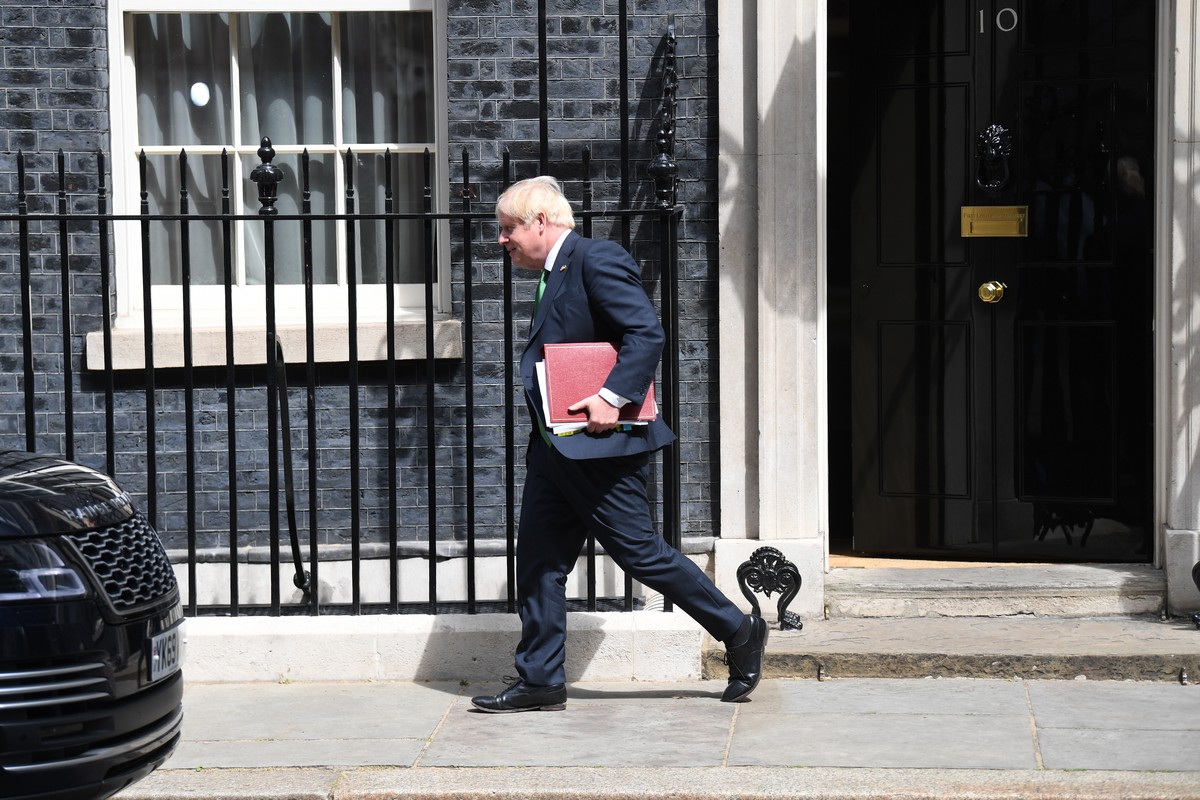 epa10068374 British Prime Minister Boris Johnson departs 10 Downing Street for Prime Minister's Questions at Parliament in London, Britain, 13 July 2022. This is Johnson's penultimate PMQ  ...