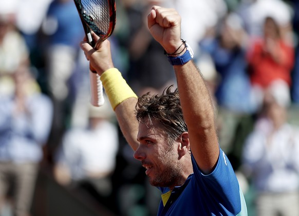 epa06019180 Stanislas Wawrinka of Switzerland reacts after winning against Andy Murray of Britain during their men’s singles semi final match during the French Open tennis tournament at Roland Garros  ...