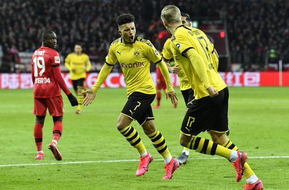 Dortmund&#039;s Jadon Sancho celebrates before his goal was cancelled during the German Bundesliga soccer match between Bayer Leverkusen and Borussia Dortmund in Leverkusen, Germany, Saturday, Feb. 8, ...