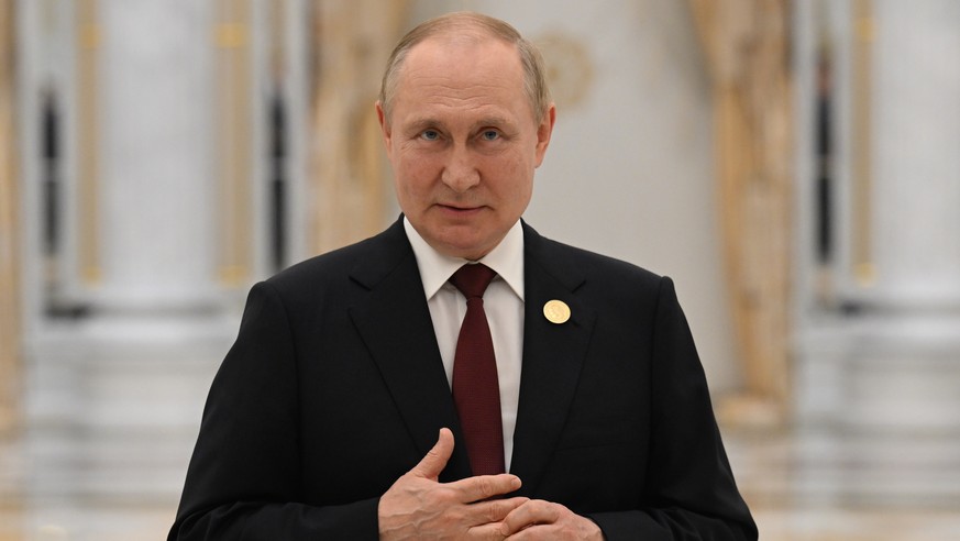 FILE - Russian President Vladimir Putin speaks to the media after the summit of Caspian Sea littoral states in Ashgabat, Turkmenistan, Thursday, June 30, 2022. The International Criminal Court said Fr ...