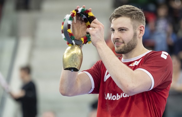 Switzerland's Samuel Roethlisberger with the most valuable player cow bell during the Yellow Cup Handball game between Switzerland and Netherlands in Switzerland, Winterthur, Sunday 05 January 20 ...