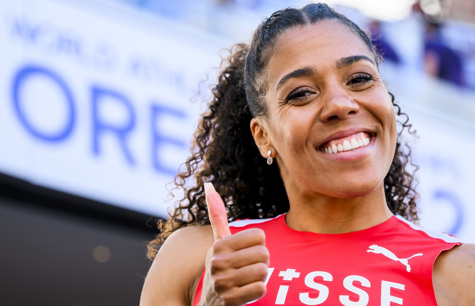 Mujinga Kambundji of Switzerland reacts for the women&#039;s 100 meters qualification during the IAAF World Athletics Championships, at the Hayward Field stadium, in Eugene, United States, Saturday, J ...