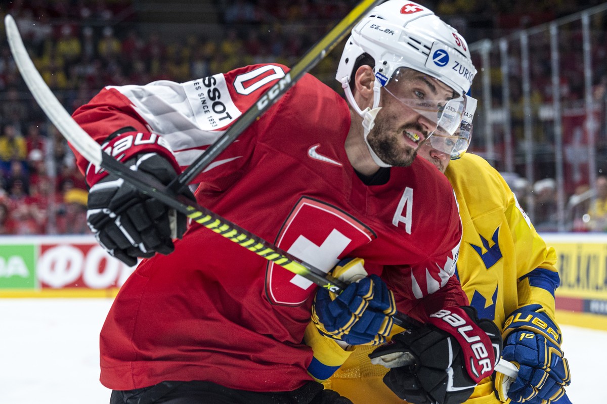 Switzerland's Roman Josi, left, against Sweden`s William Nylander during the game between Sweden and Switzerland, at the IIHF 2019 World Ice Hockey Championships, at the Ondrej Nepela Arena in Br ...