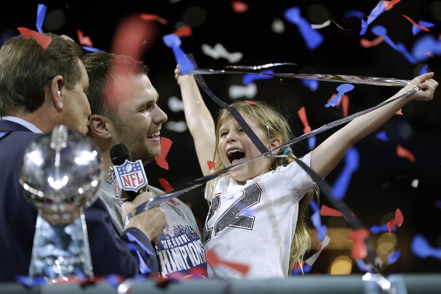 New England Patriots&#039; Tom Brady celebrates with his daughter, Vivian, after the NFL Super Bowl 53 football game against the Los Angeles Rams, Sunday, Feb. 3, 2019, in Atlanta. The Patriots won 13 ...