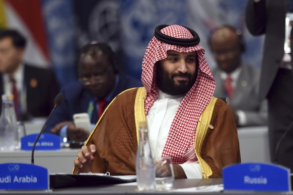 FILE - In this Dec. 1, 2018, file, photo released by the press office of the G20 Summit Saudi Arabia&#039;s Crown Prince Mohammed bin Salman attends a plenary session on the second day of the G20 Lead ...