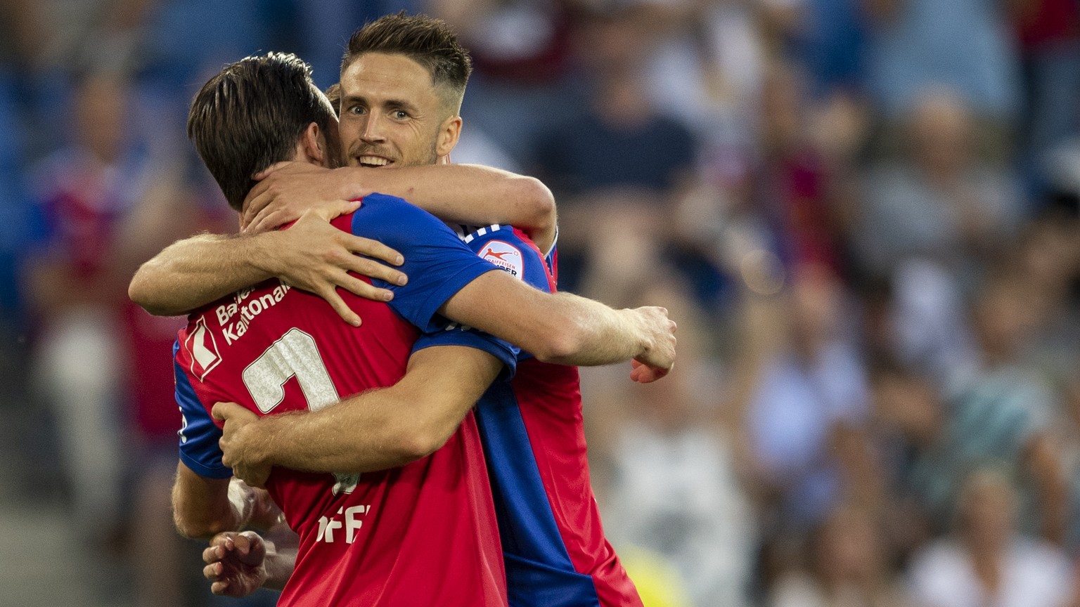 Basel&#039;s Ricky van Wolfswinkel, right, celebrate his 1:0 goal during the UEFA Europa League play-off first leg match between Switzerland&#039;s FC Basel 1893 and Cyprus&#039; Apollon Limassol FC i ...