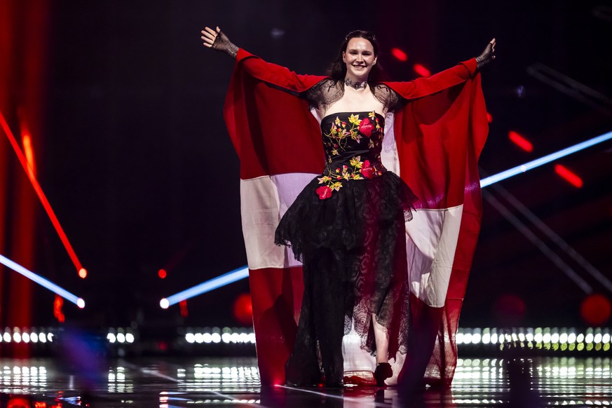 Switzerland&#039;s Zoe Me takes part in the flag parade during the dress rehearsal and preview show of the final at the 69th Eurovision Song Contest in Basel, Switzerland, on Friday, May 16, 2025. (KE ...