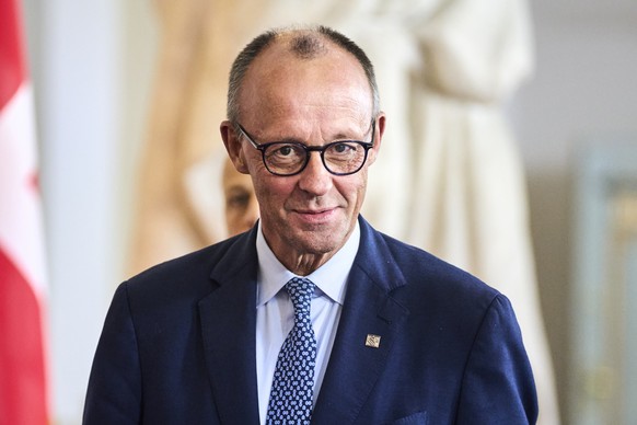 epa12421320 Germany&#039;s Chancellor Friedrich Merz (C) after the informal summit in the Danish parliament at Christiansborg Castle in Copenhagen, Denmark, 01 October 2025. EPA/THOMAS TRAASDAHL DENMA ...